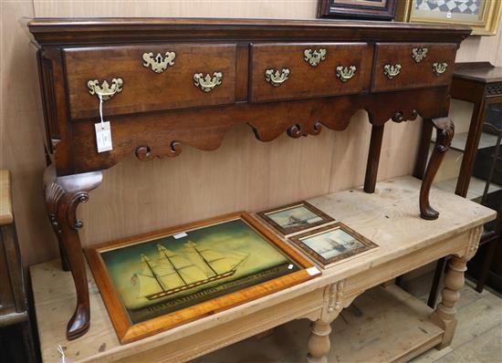 A George III style crossbanded oak low dresser W.151cm
